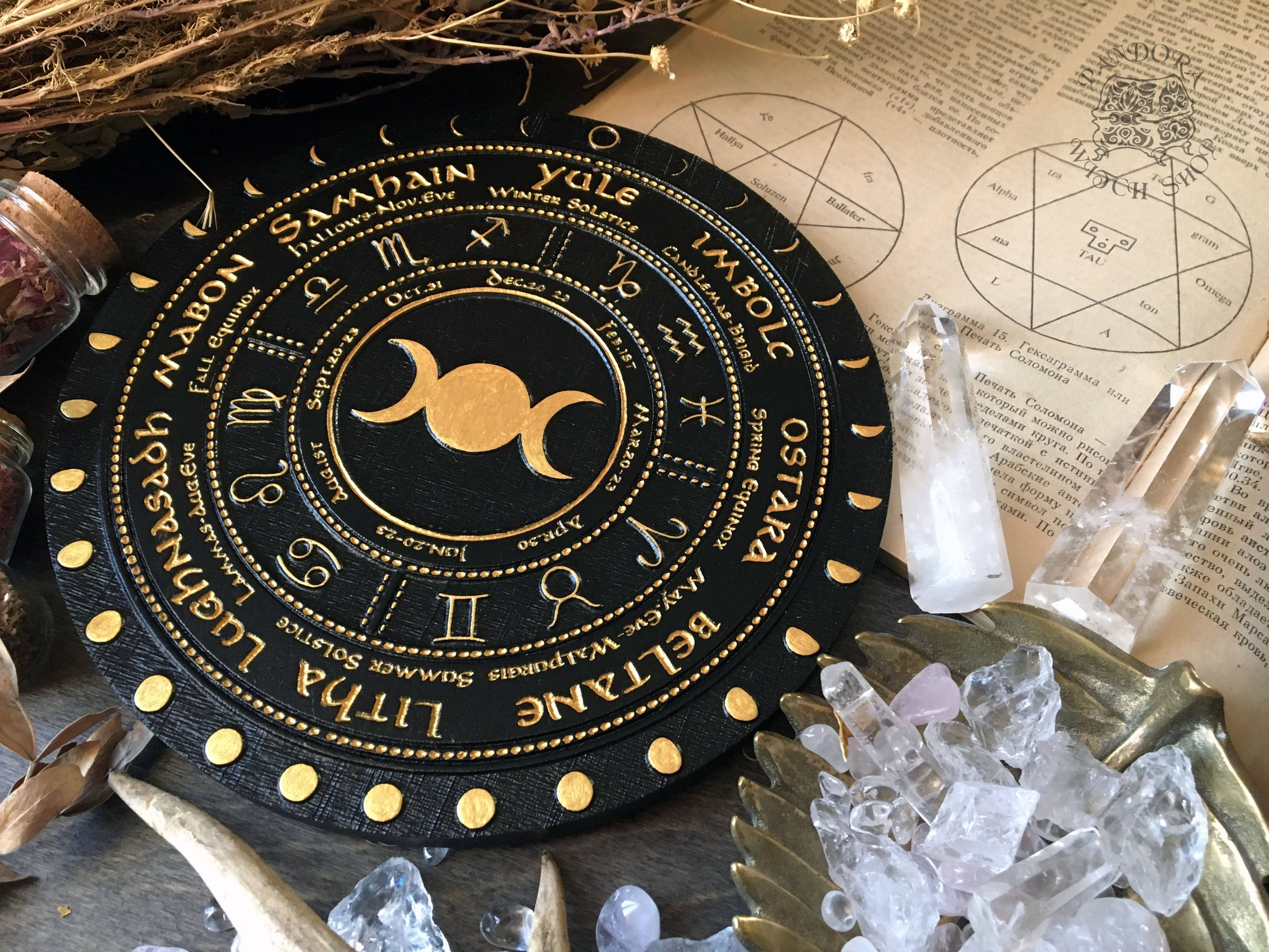 Wooden Wheel of the Year - calendar of pagan festivals and seasonal sabbaths: Yule, Imbolc, Ostara, Beltane, Litha, Lammas, Mabon, Samhain.