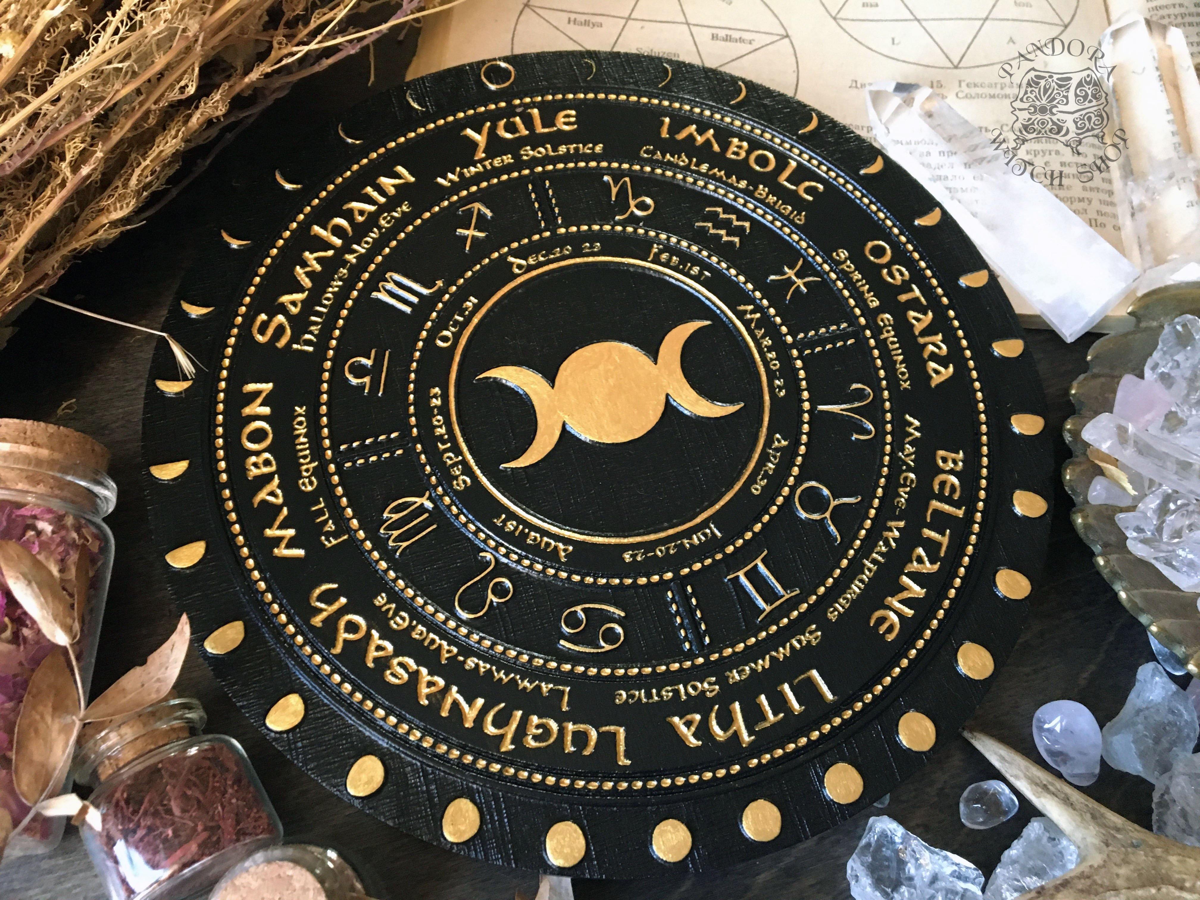 Wooden Wheel of the Year - calendar of pagan festivals and seasonal sabbaths: Yule, Imbolc, Ostara, Beltane, Litha, Lammas, Mabon, Samhain.