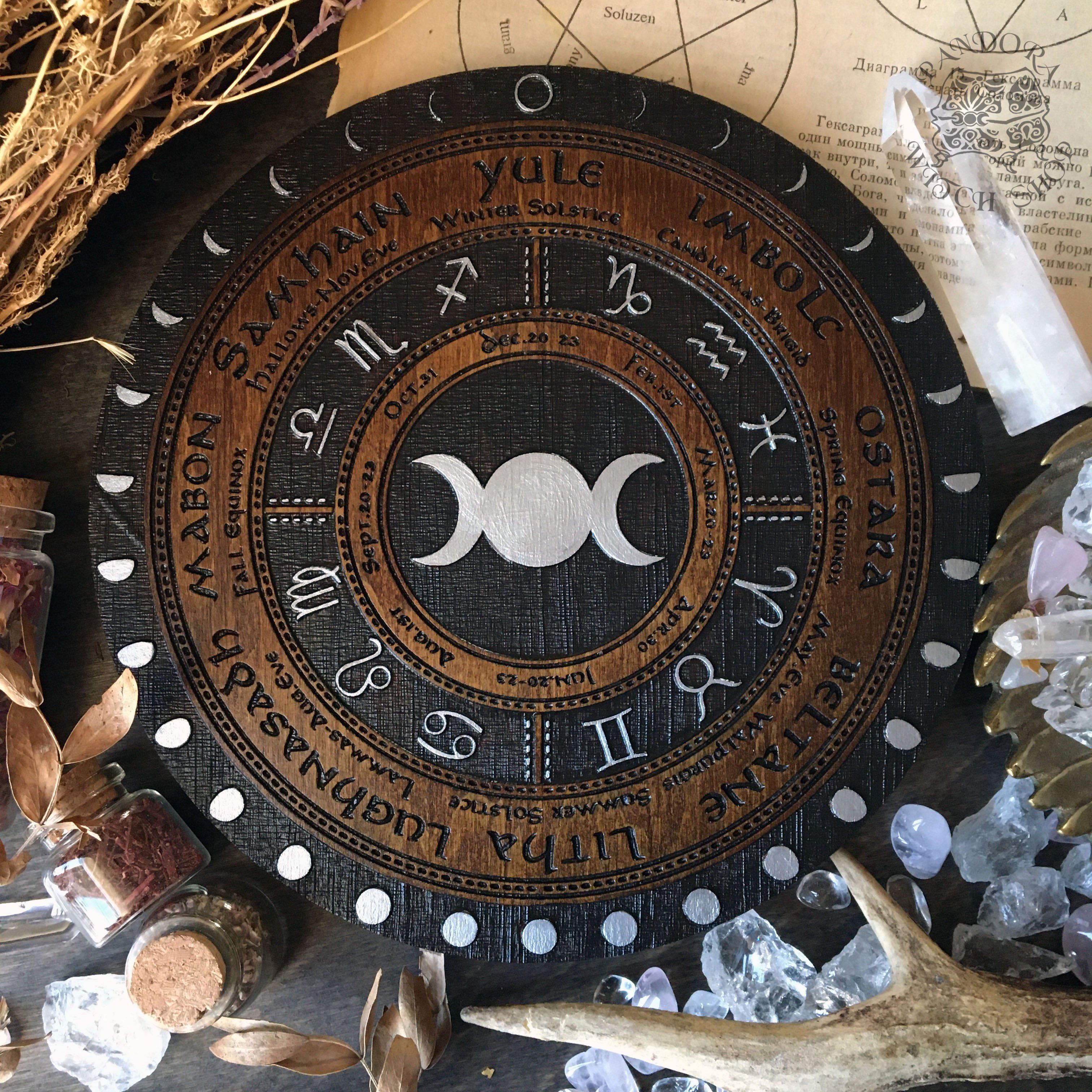 Wooden Wheel of the Year - calendar of pagan festivals and seasonal sabbaths: Yule, Imbolc, Ostara, Beltane, Litha, Lammas, Mabon, Samhain.