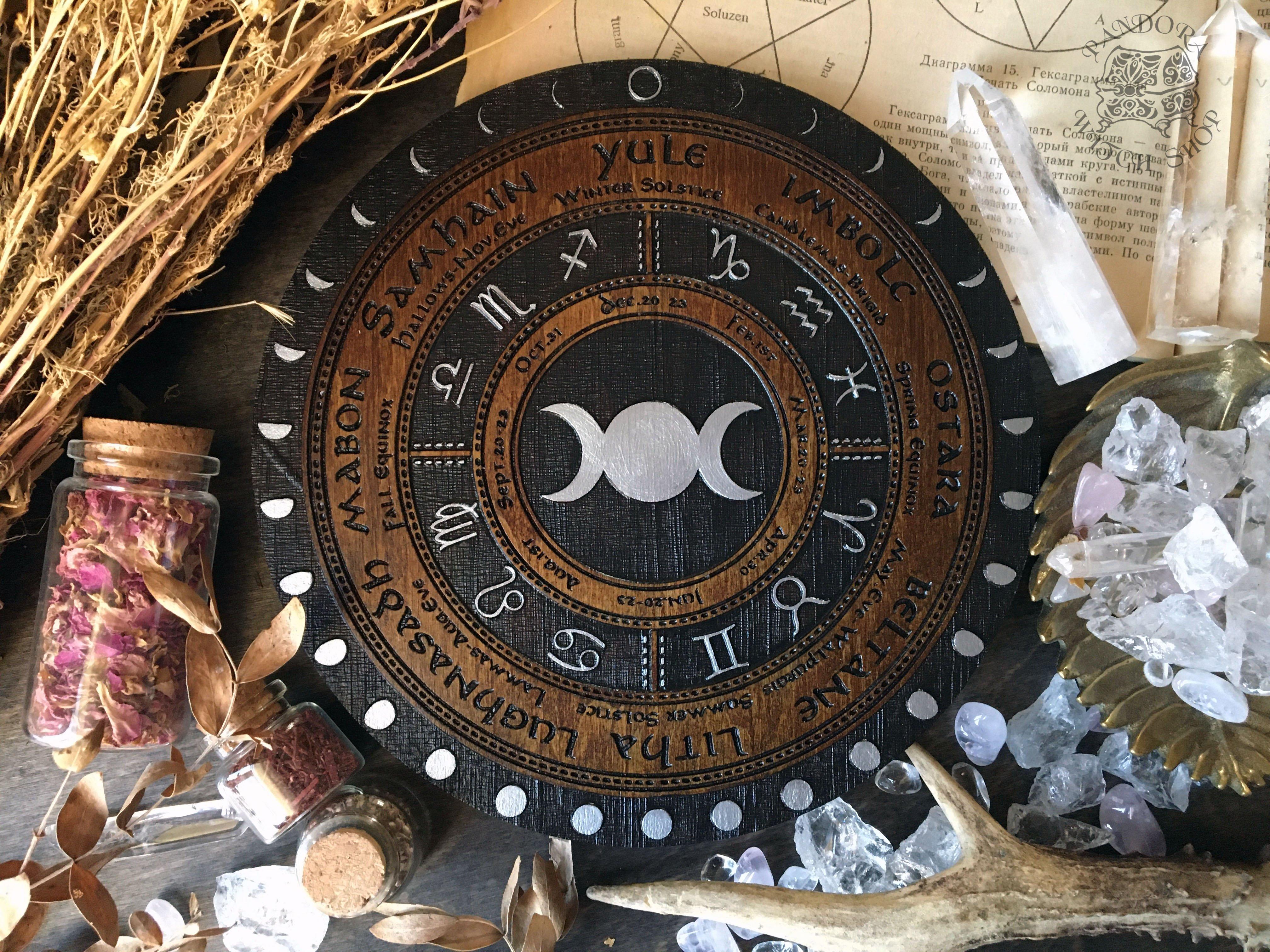 Wooden Wheel of the Year - calendar of pagan festivals and seasonal sabbaths: Yule, Imbolc, Ostara, Beltane, Litha, Lammas, Mabon, Samhain.