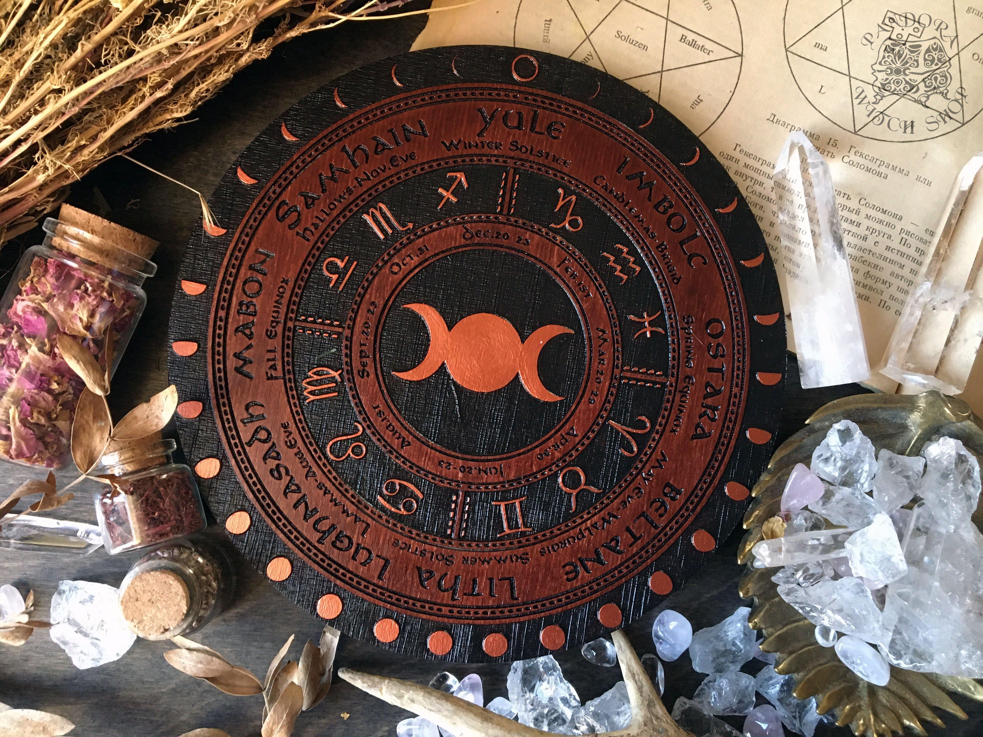 Wooden Wheel of the Year - calendar of pagan festivals and seasonal sabbaths: Yule, Imbolc, Ostara, Beltane, Litha, Lammas, Mabon, Samhain.