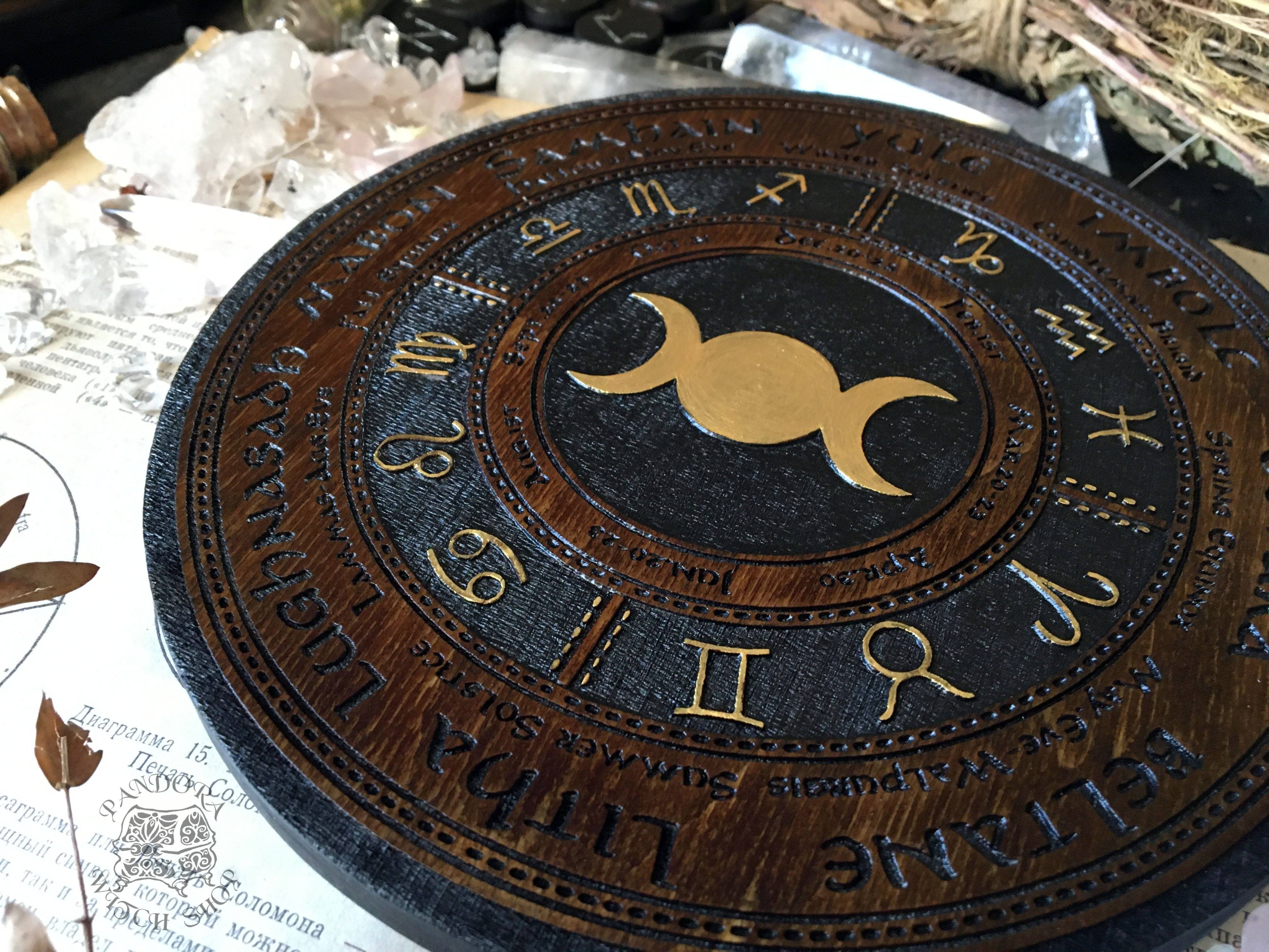 Wooden Wheel of the Year - calendar of pagan festivals and seasonal sabbaths: Yule, Imbolc, Ostara, Beltane, Litha, Lammas, Mabon, Samhain.