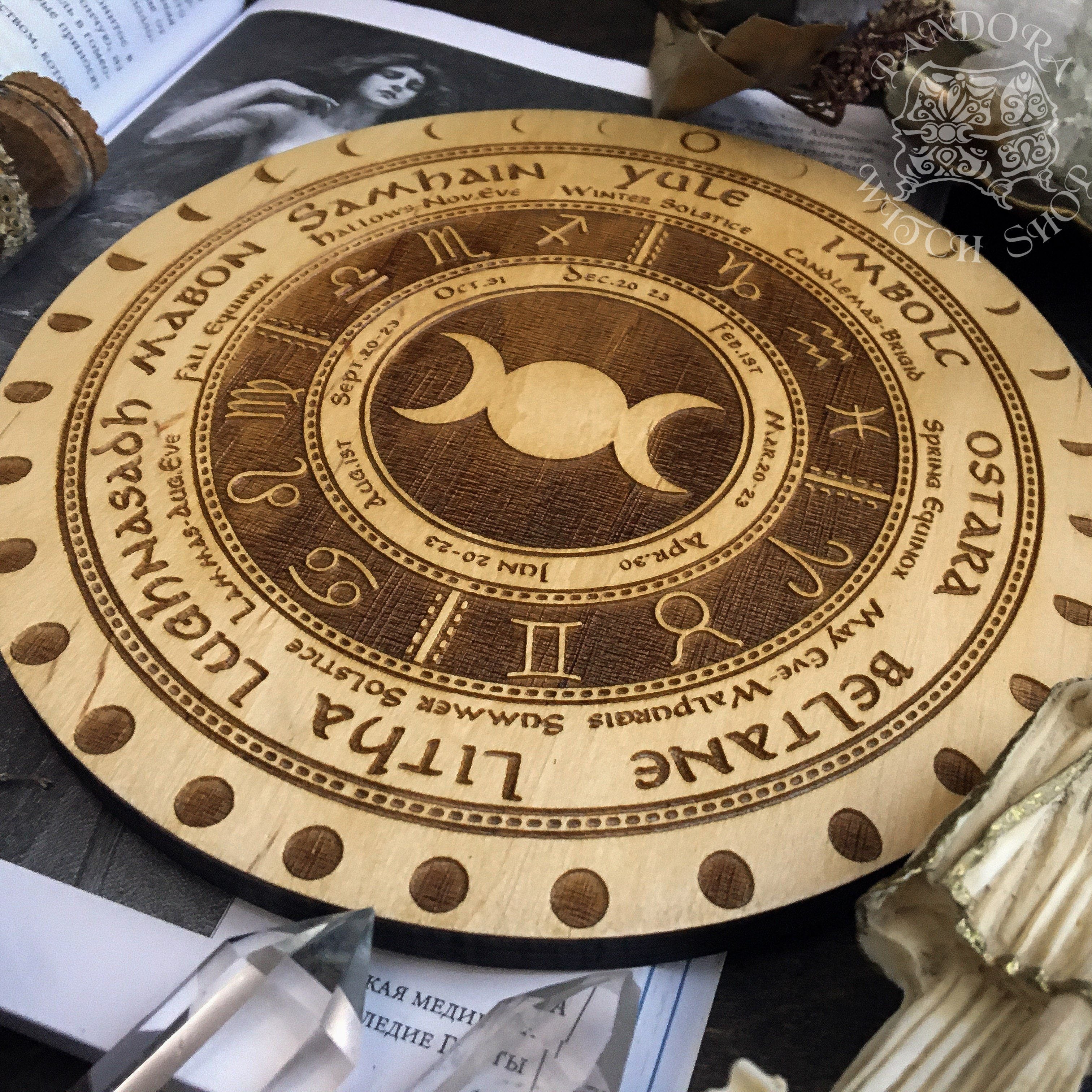 Wooden Wheel of the Year - calendar of pagan festivals and seasonal sabbaths: Yule, Imbolc, Ostara, Beltane, Litha, Lammas, Mabon, Samhain.