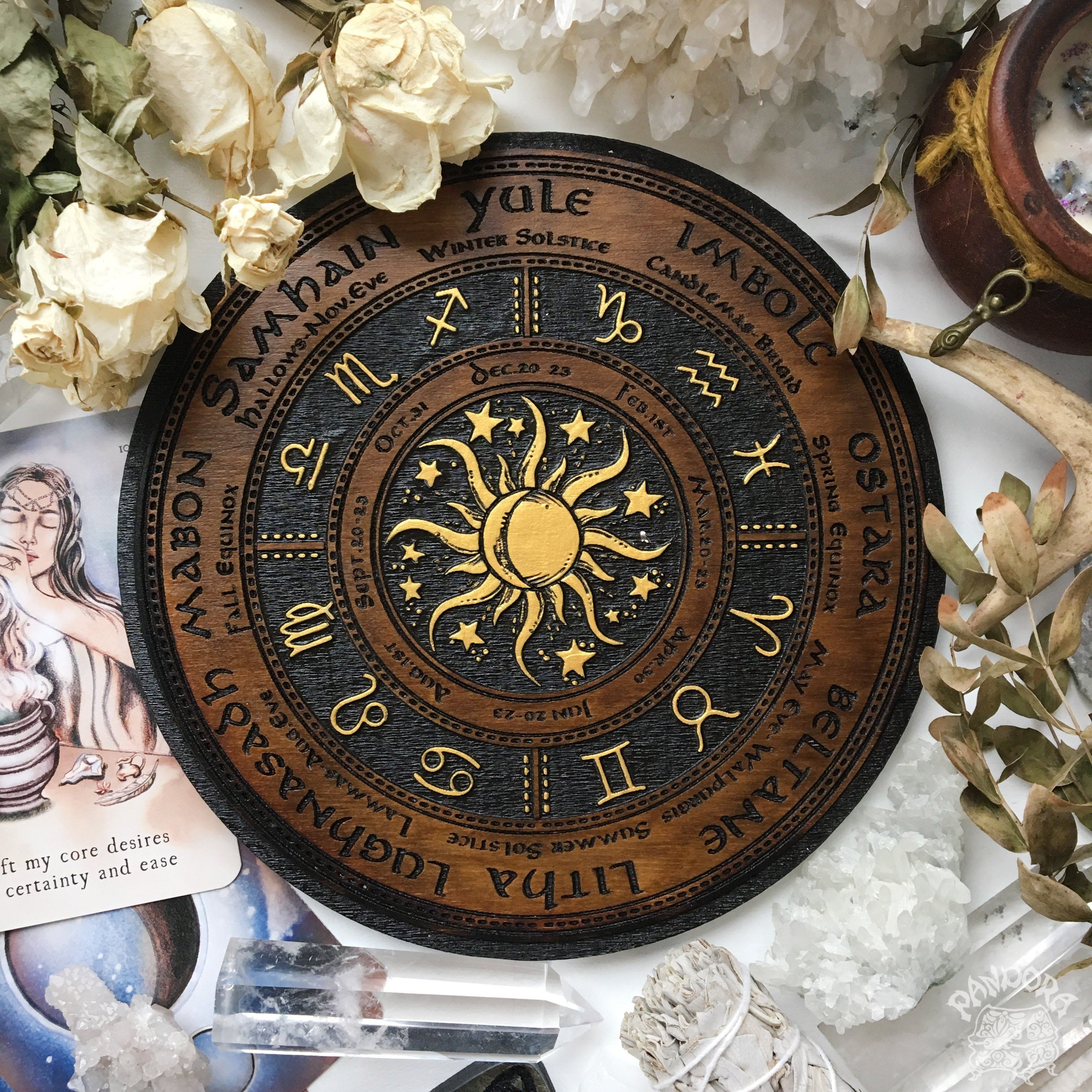 Wooden Wheel of the Year - calendar of pagan festivals and seasonal sabbaths: Yule, Imbolc, Ostara, Beltane, Litha, Lammas, Mabon, Samhain. 