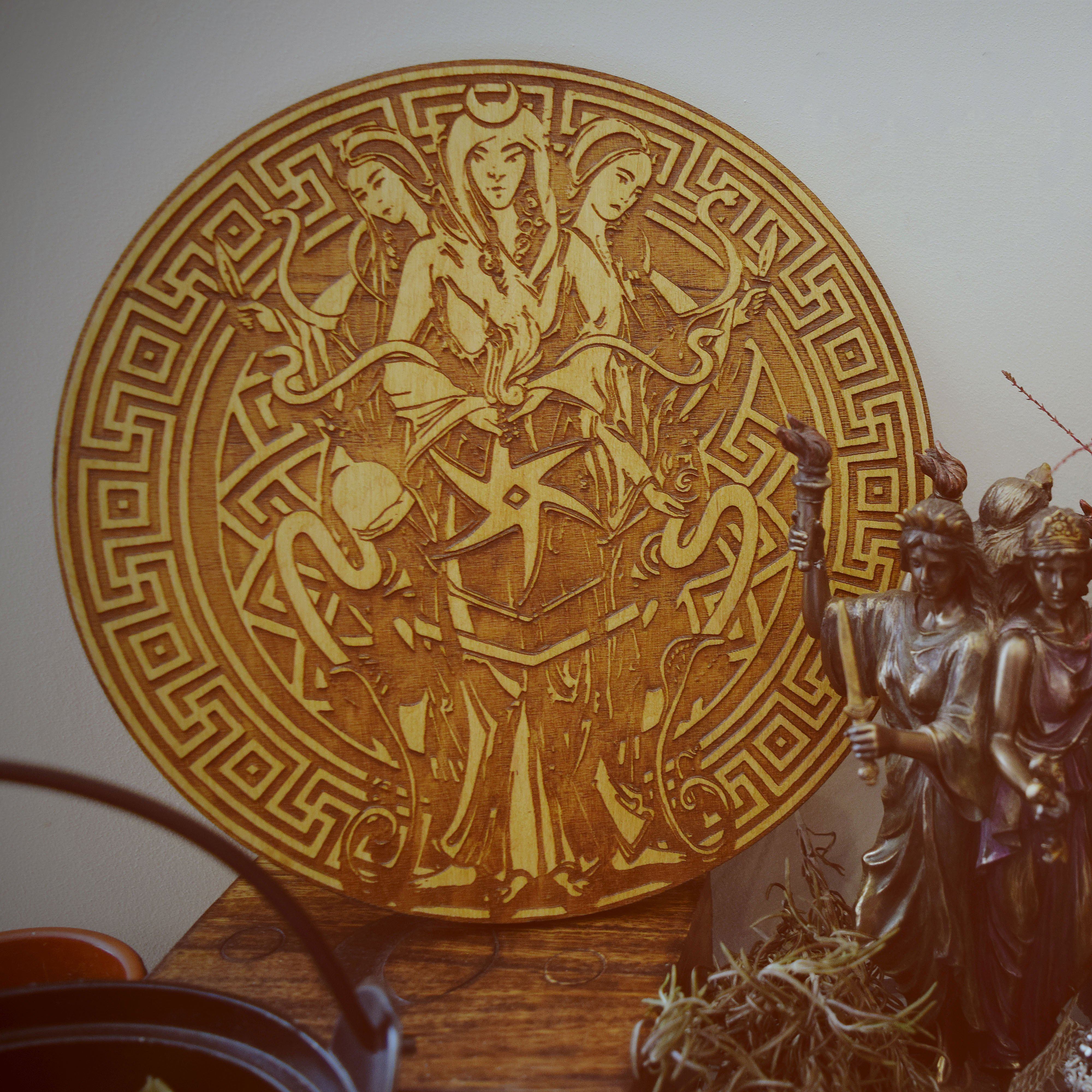 Wooden pentacle with engraving goddess Hecate (Hekate) from  ancient Greek religion and mythology. Great goddess of witchcraft, crossroads, light, magic, knowledge and sorcery.