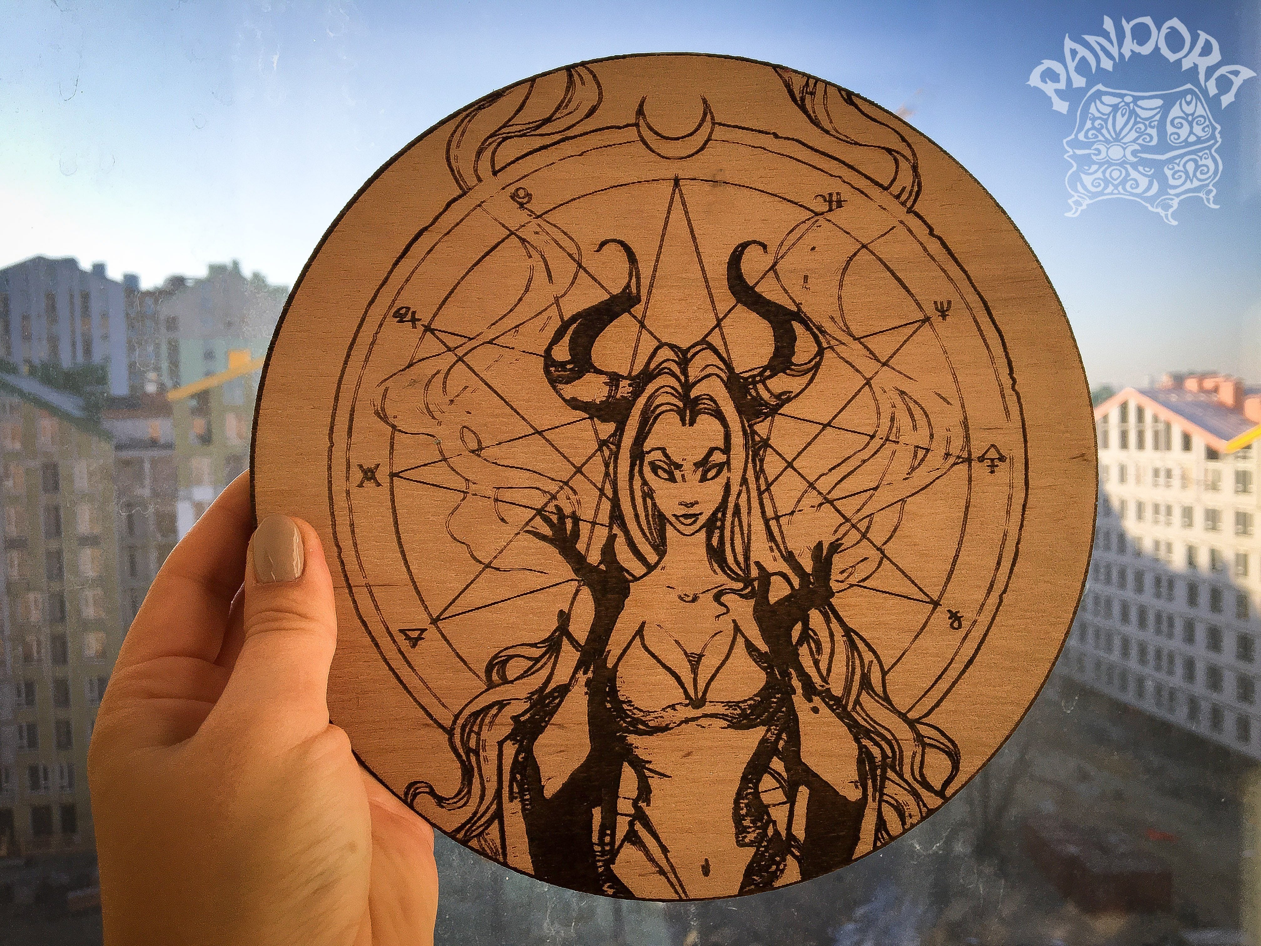 Wooden pentacle with engraving dark goddess Lilith. Often envisioned as a dangerous female demon. 