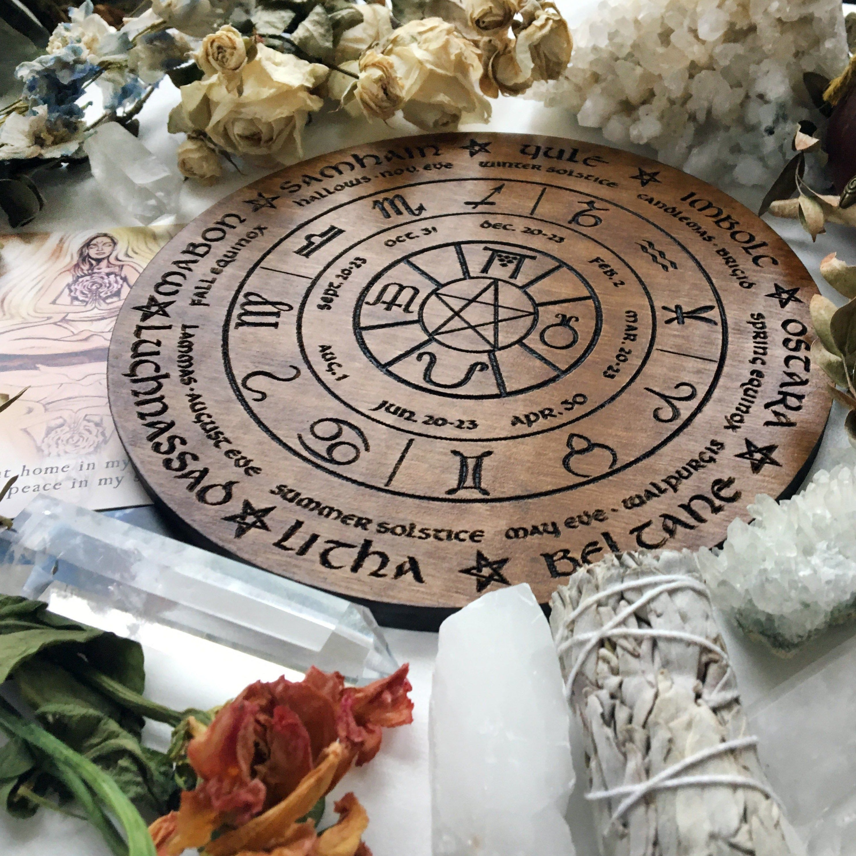 Wooden Wheel of the Year - calendar of pagan festivals and seasonal sabbaths: Yule, Imbolc, Ostara, Beltane, Litha, Lammas, Mabon, Samhain. 