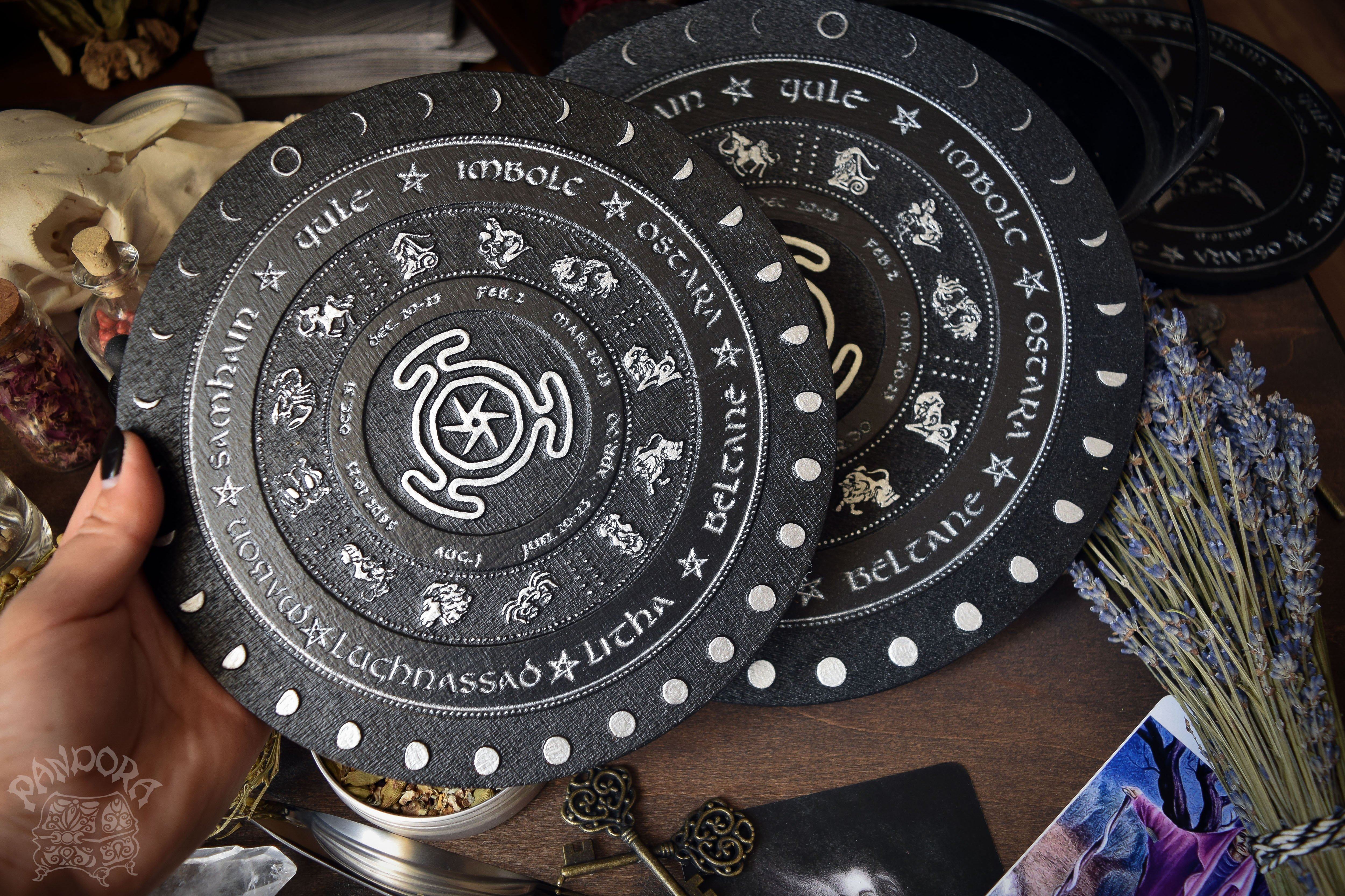 Wooden Wheel of the Year - calendar of pagan festivals and seasonal sabbaths: Yule, Imbolc, Ostara, Beltane, Litha, Lammas, Mabon, Samhain. 