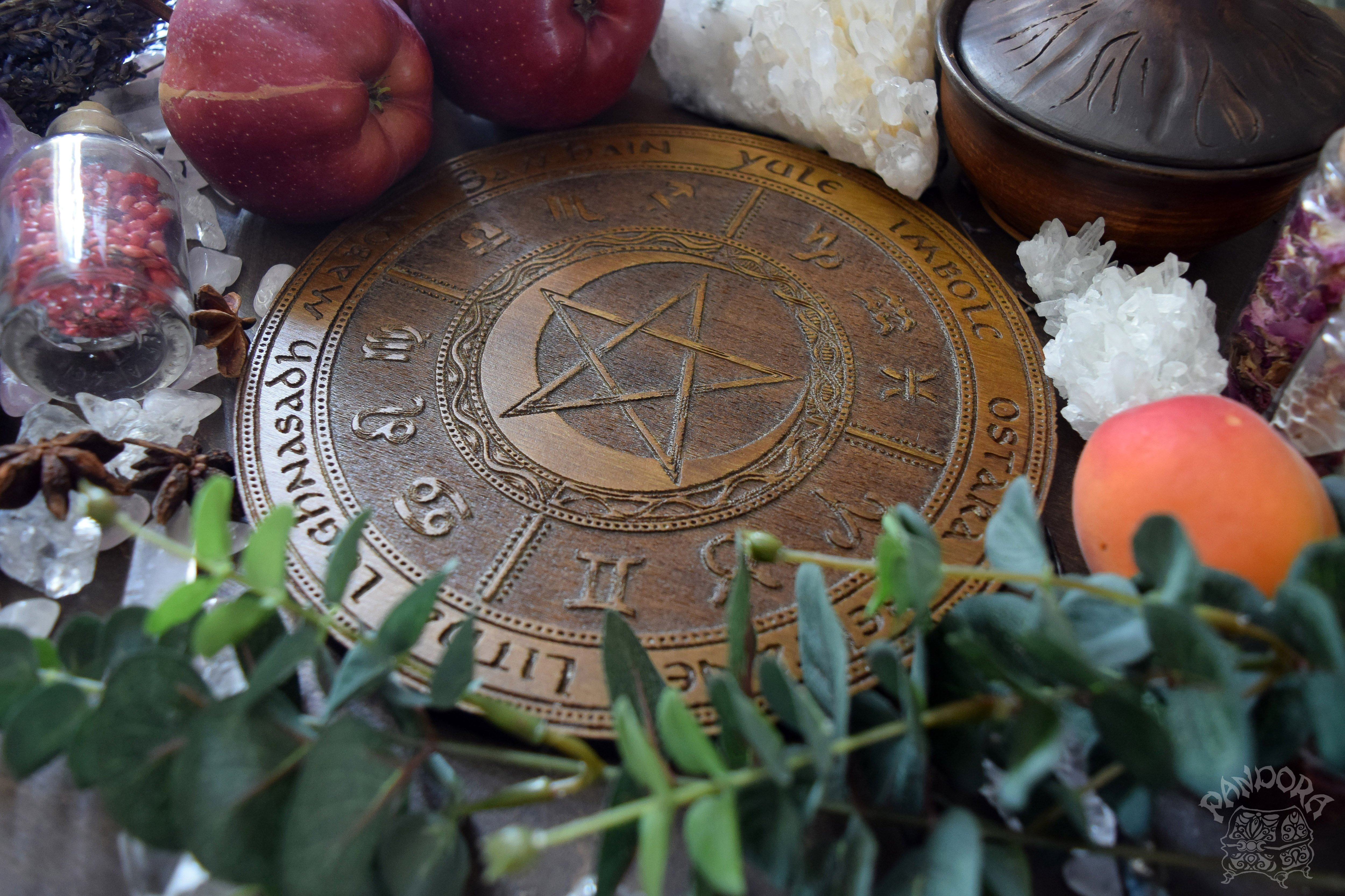 Wooden Wheel of the Year - calendar of pagan festivals and seasonal sabbaths: Yule, Imbolc, Ostara, Beltane, Litha, Lammas, Mabon, Samhain. 