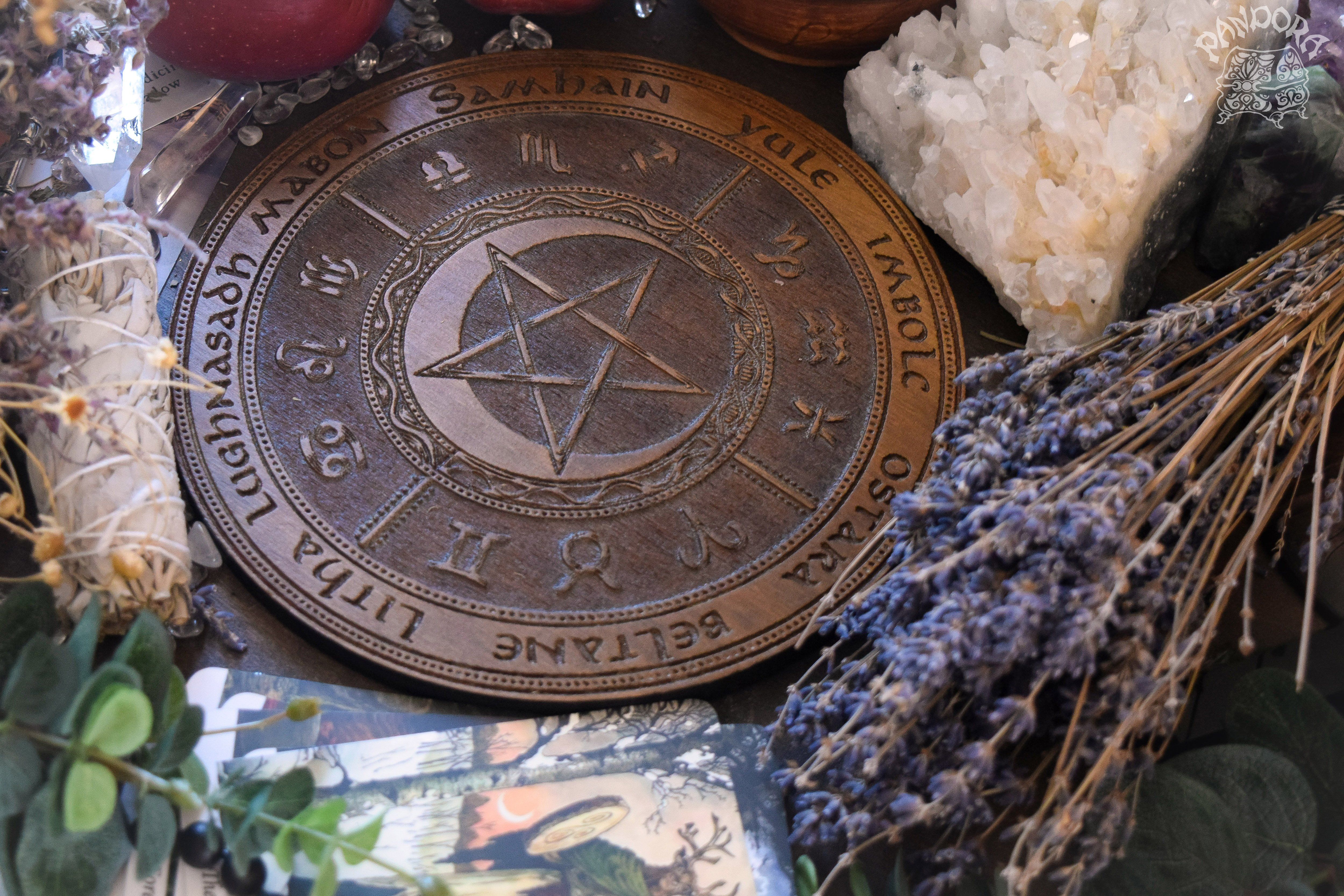 Wooden Wheel of the Year - calendar of pagan festivals and seasonal sabbaths: Yule, Imbolc, Ostara, Beltane, Litha, Lammas, Mabon, Samhain. 