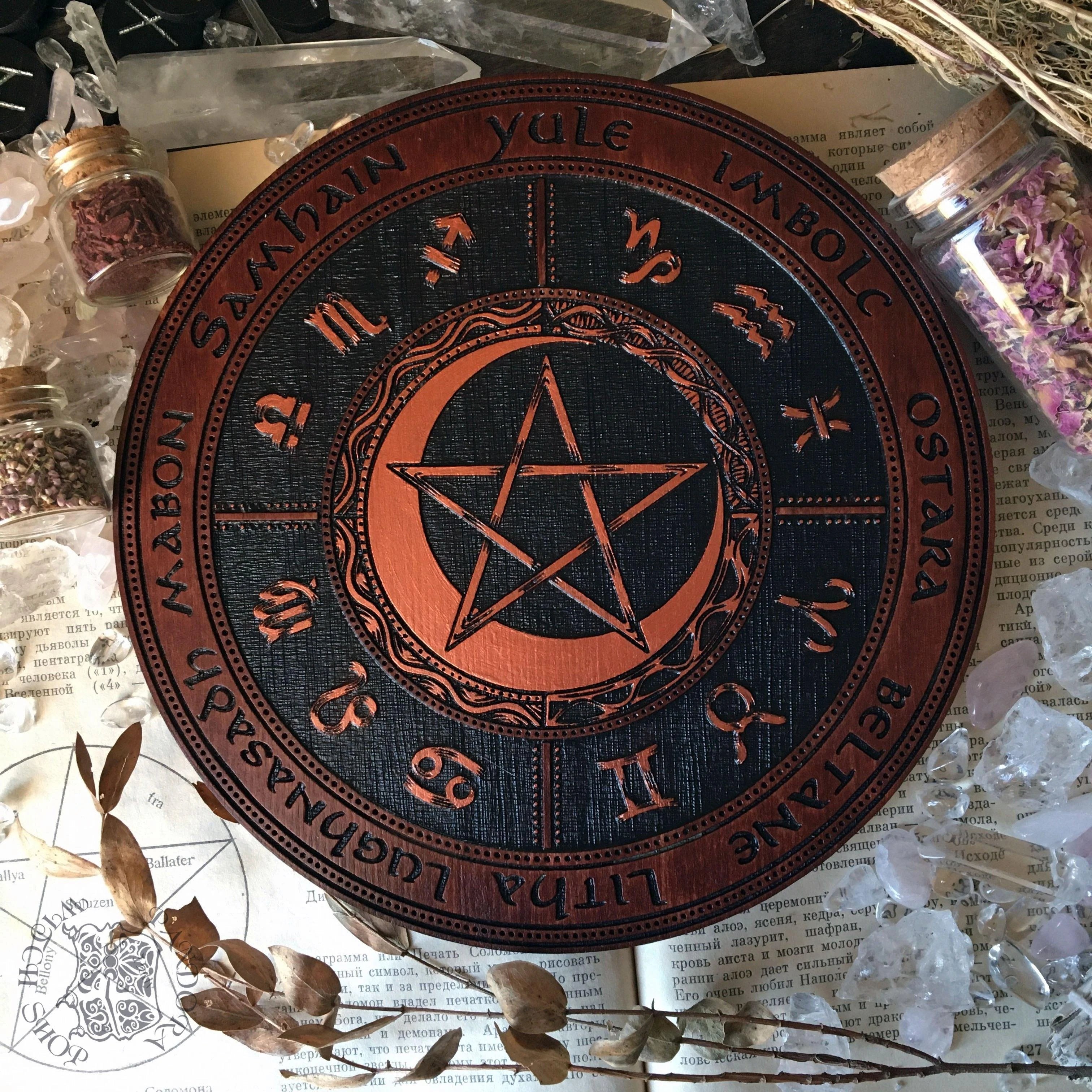 Wooden Wheel of the Year - calendar of pagan festivals and seasonal sabbaths: Yule, Imbolc, Ostara, Beltane, Litha, Lammas, Mabon, Samhain. 