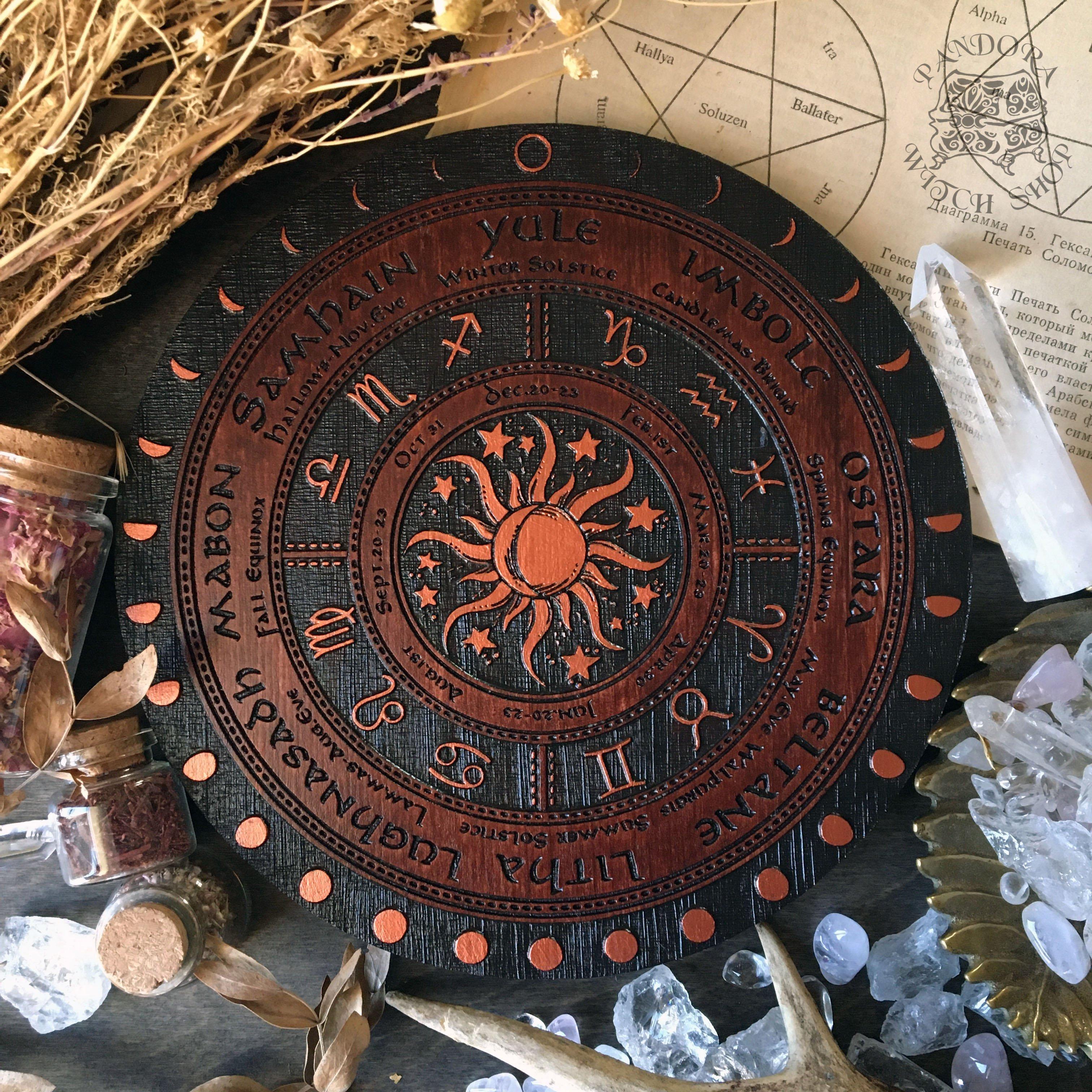 Wooden Wheel of the Year - calendar of pagan festivals and seasonal sabbaths: Yule, Imbolc, Ostara, Beltane, Litha, Lammas, Mabon, Samhain. 